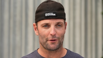 Wes Welker, picutred as the Miami Dolphins wide receivers coach, speaks after practice in June 2024.