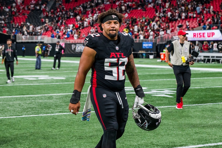 Former Atlanta Falcons guard Jovaughn Gwyn walks off the field after the team's Week 4 game against the Washington Commanders.