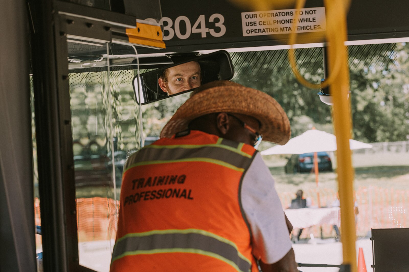 Jim Webster guides and coaches Banner transportation reporter Danny Zawodny through the obstacle course at the Bus and Maintenance Roadeo on Sept. 14, 2024, in Baltimore.