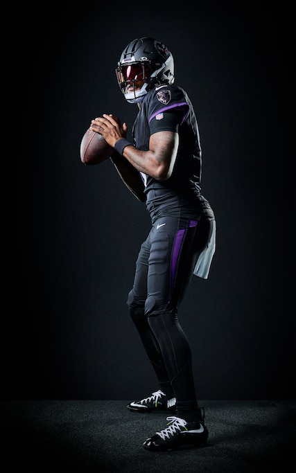 Baltimore Ravens Lamar Jackson models the newly-redesigned team uniform.