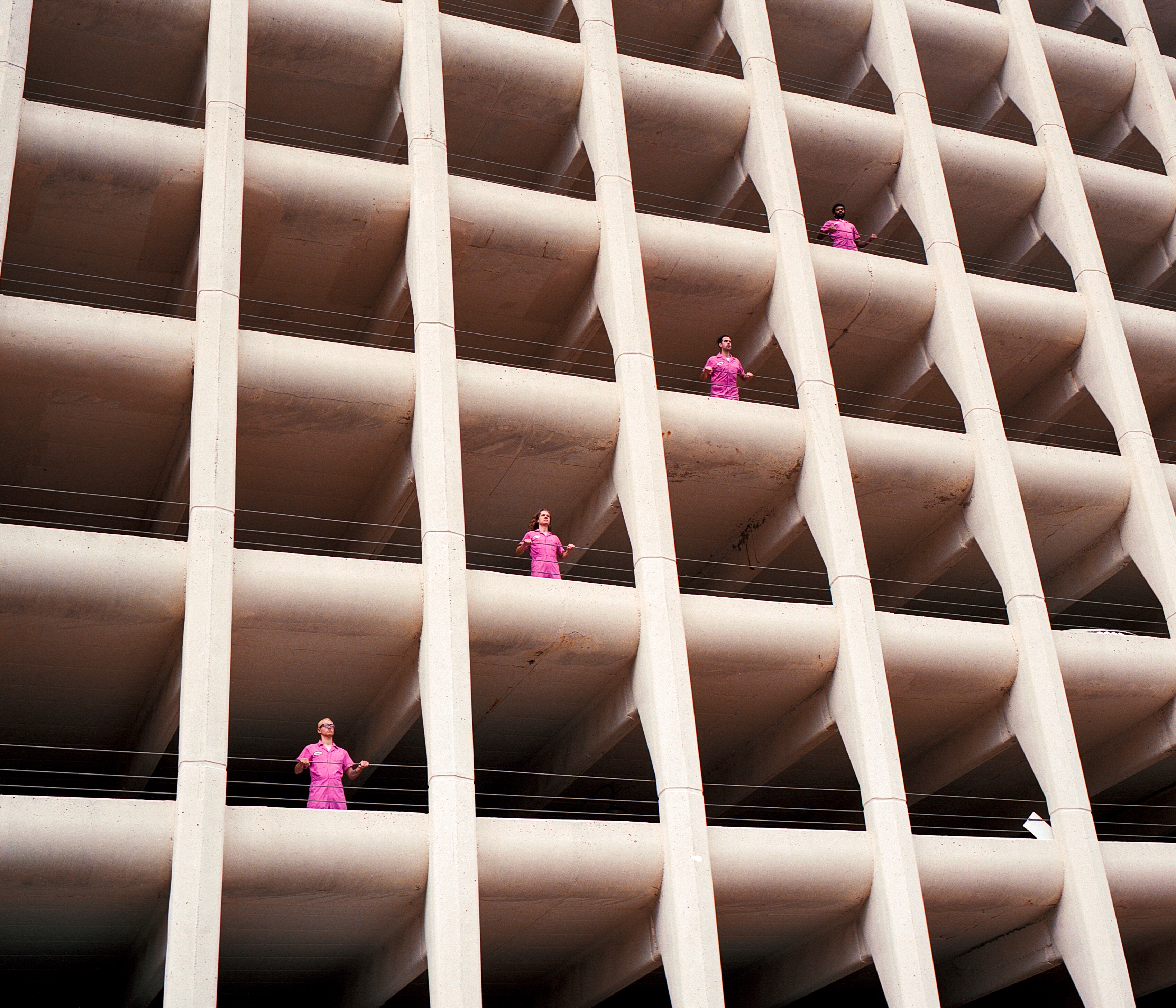A portrait of Powerwasher in a Baltimore parking garage is featured in "Scene Seen."