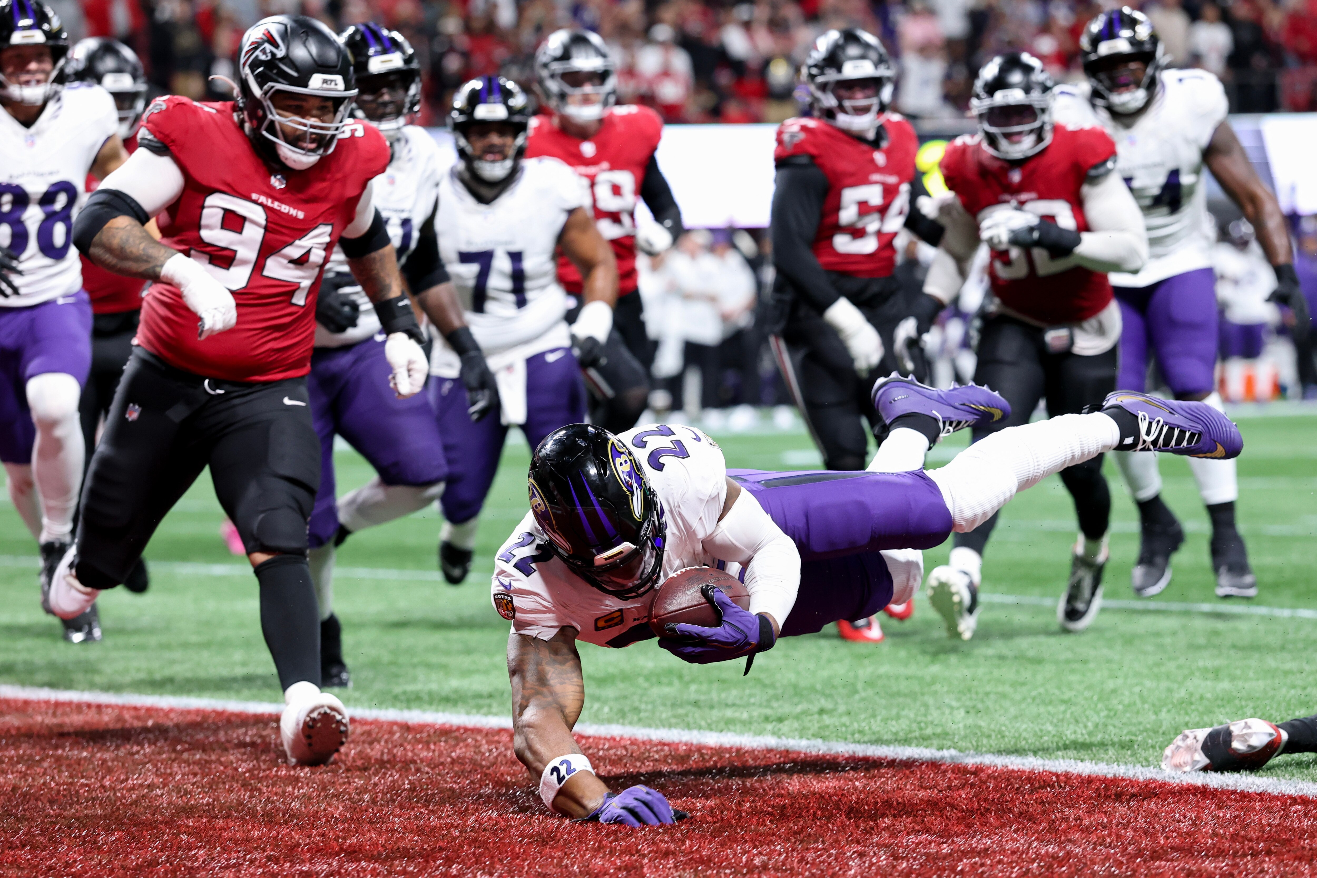 Baltimore Ravens running back Derrick Henry converts a 2-point conversion to tie Sunday’s game against the Atlanta Falcons in the final minute of regulation. The Ravens won 30-23 in overtime.