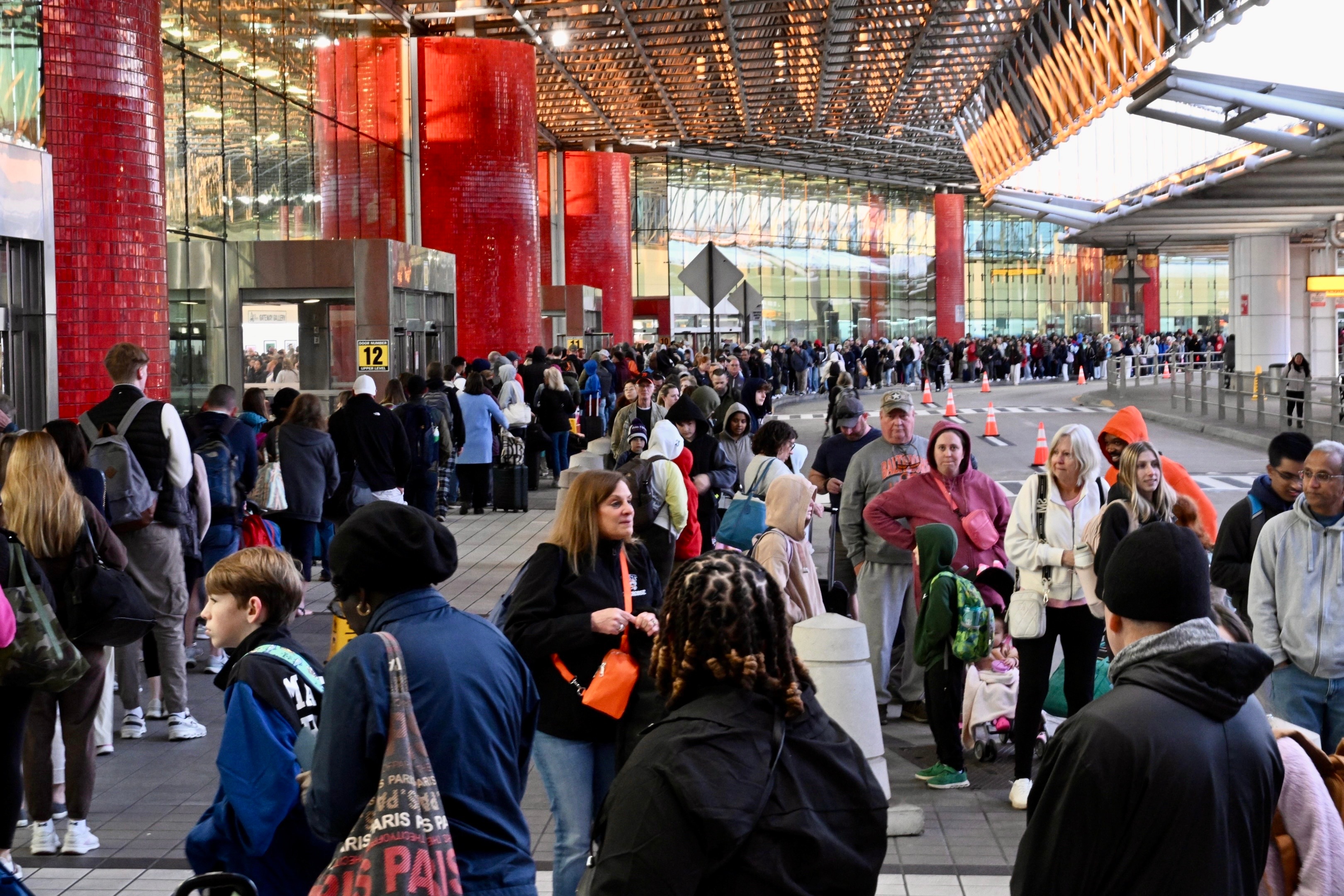 The spring break surge sends BWI lines three travelers deep on Saturday, March 28, 2026.