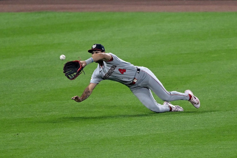 Washington Nationals left fielder Daylen Lile catches a fly ball hit by Orioles first baseman Pete Alonso in the sixth inning of a game on June 27.