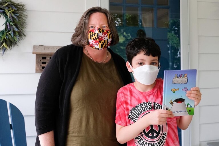 Maryland State Delegate Cathy Forbes meets her young constituent and author Orion Filippazzo.