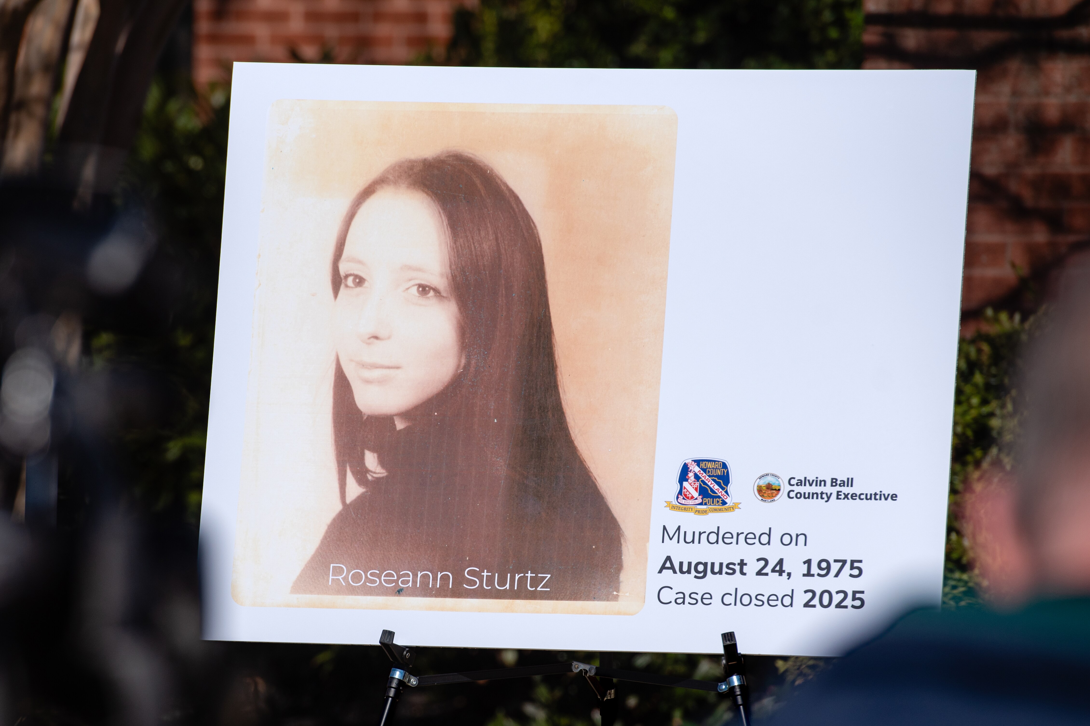 A photograph of Roseann Sturtz displayed during a press conference regarding the closing of her 1975 homicide case as seen on March 11th, 2025 in Ellicott City, MD.