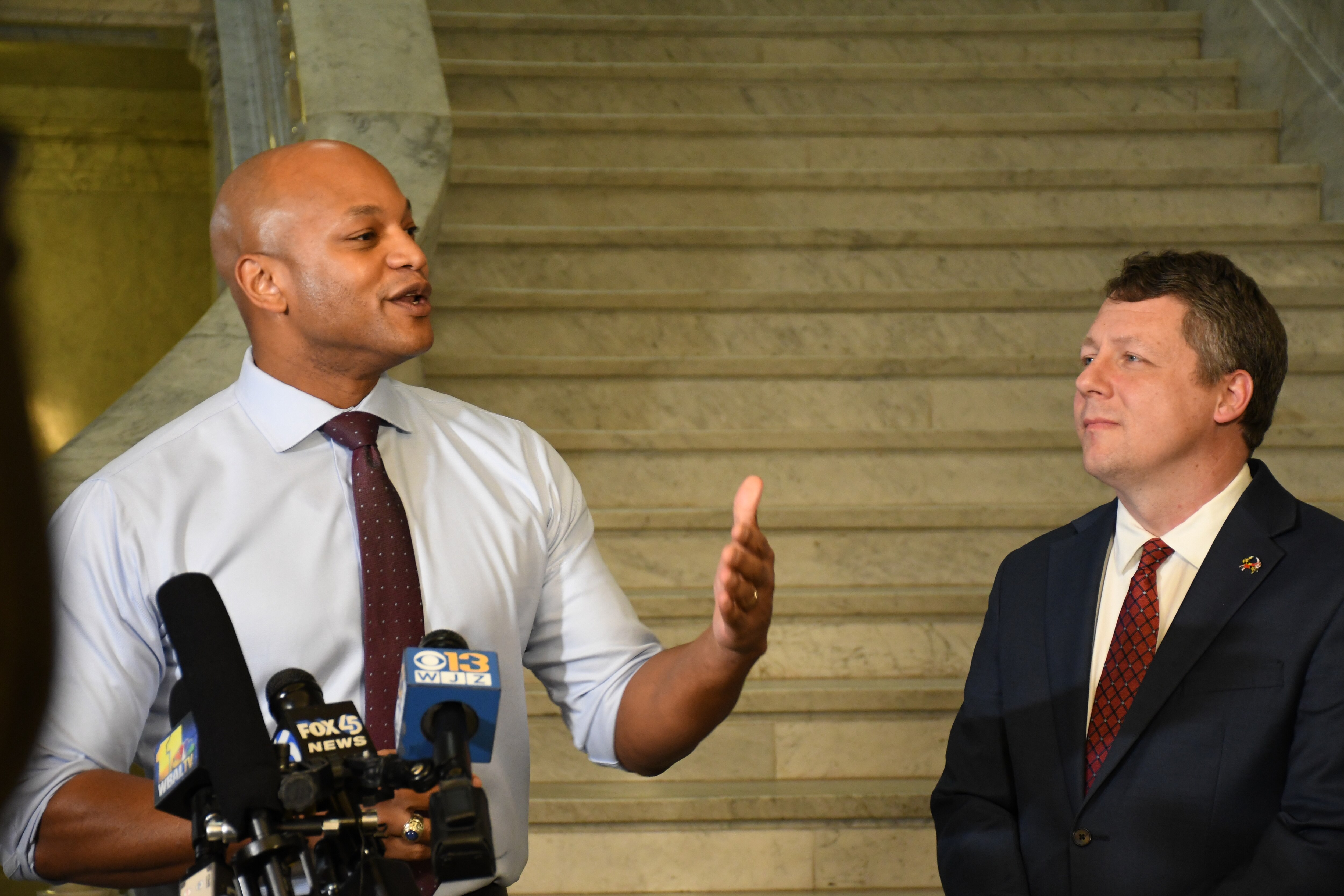 Maryland Gov. Wes Moore speaks with reporters on March 20, 2023 about his legislative agenda at the State House on “crossover” day, the deadline for bills to pass at least one chamber of the Maryland General Assembly to have the best chance of passage. He’s joined by his chief legislative officer, Eric Luedtke.