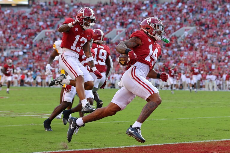 TUSCALOOSA, ALABAMA - SEPTEMBER 17: Brian Branch #14 of the Alabama Crimson Tide returns this punt for a touchdown against the Louisiana Monroe Warhawks during the fourth quarter at Bryant-Denny Stadium on September 17, 2022 in Tuscaloosa, Alabama.