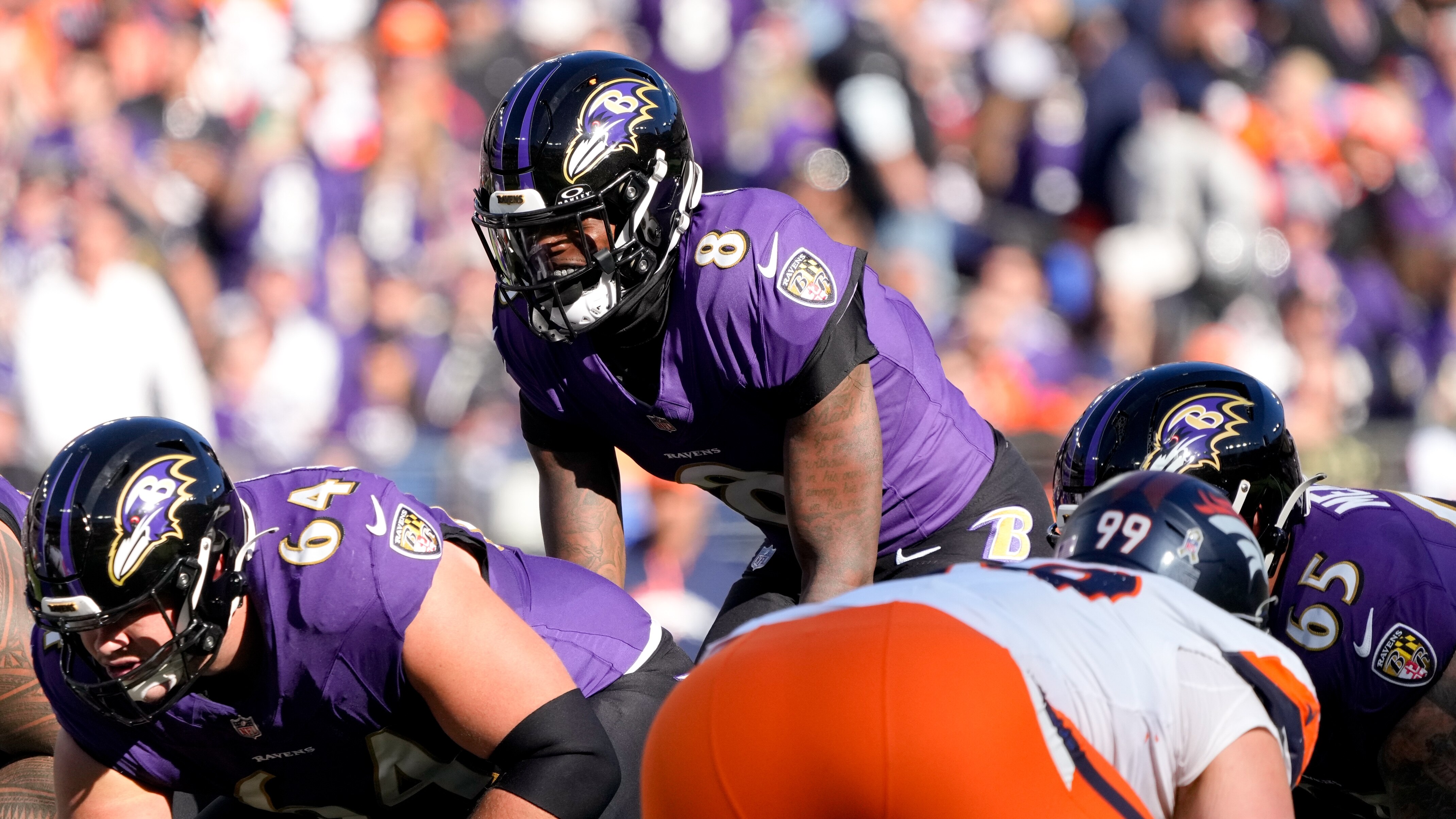 Baltimore Ravens quarterback Lamar Jackson (8) leads the offense downfield in a regular season game against the Denver Broncos at M&T Bank Stadium on Sunday, November 3, 2024.