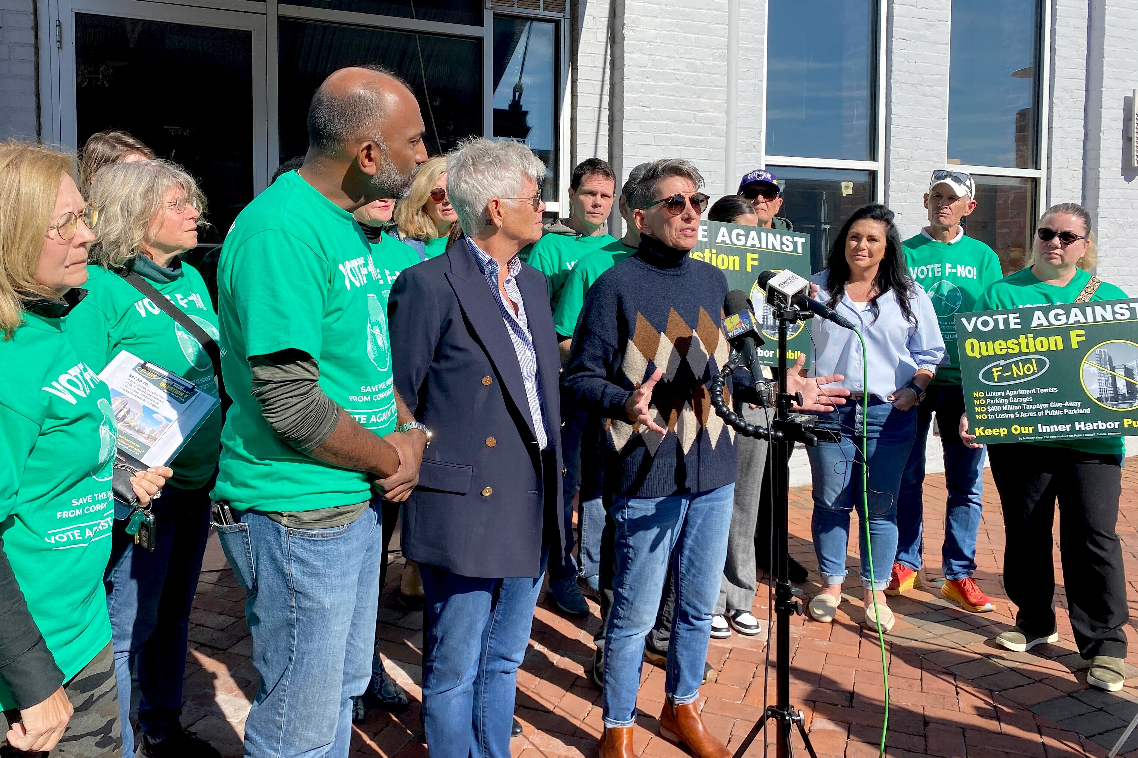 Phyllis Wert, a former owner Chesapeake Wine Company, urges voters to reject the MCB Real Estate ballot measure to add residences to Harborplace at the Inner Harbor.