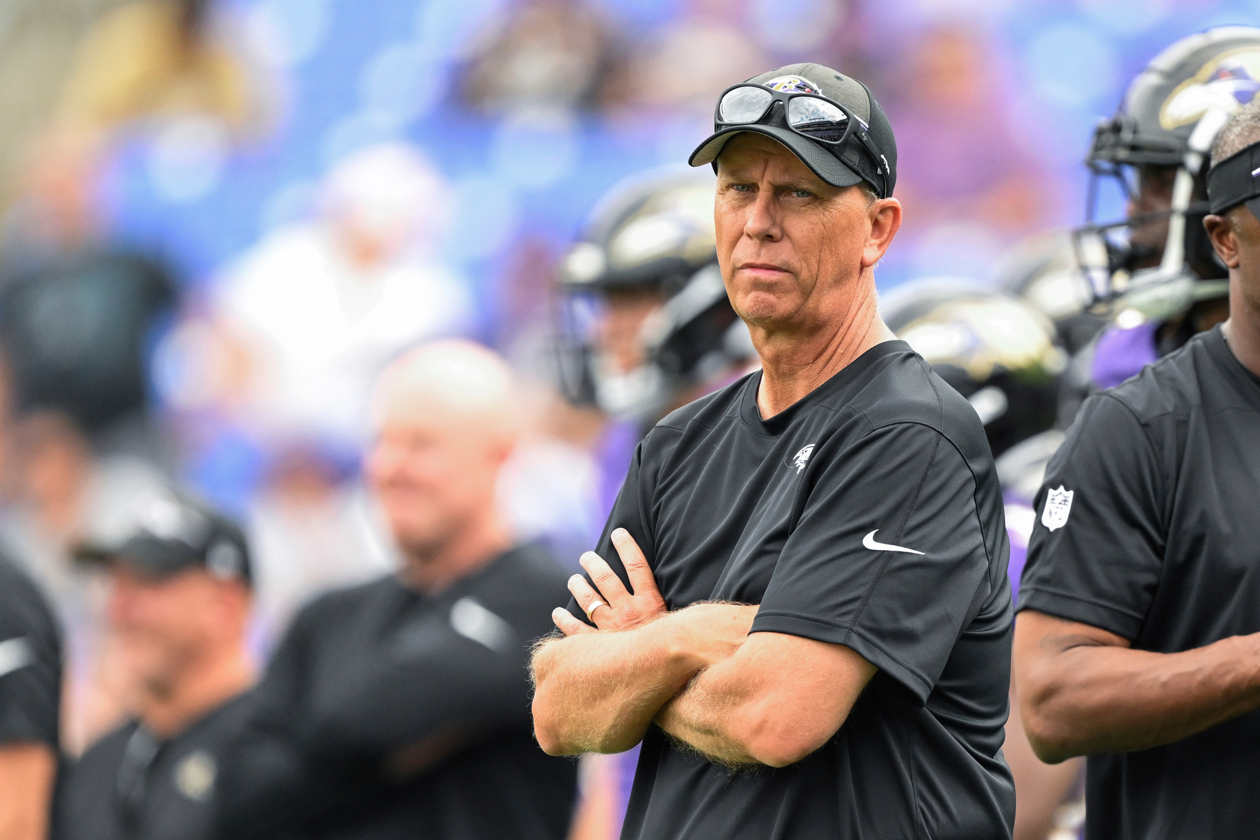 Baltimore Ravens offensive coordinator Todd Monken looks on during pre-game warmups before an NFL preseason football game against the Philadelphia Eagles, Saturday, Aug. 12, 2022, in Baltimore.