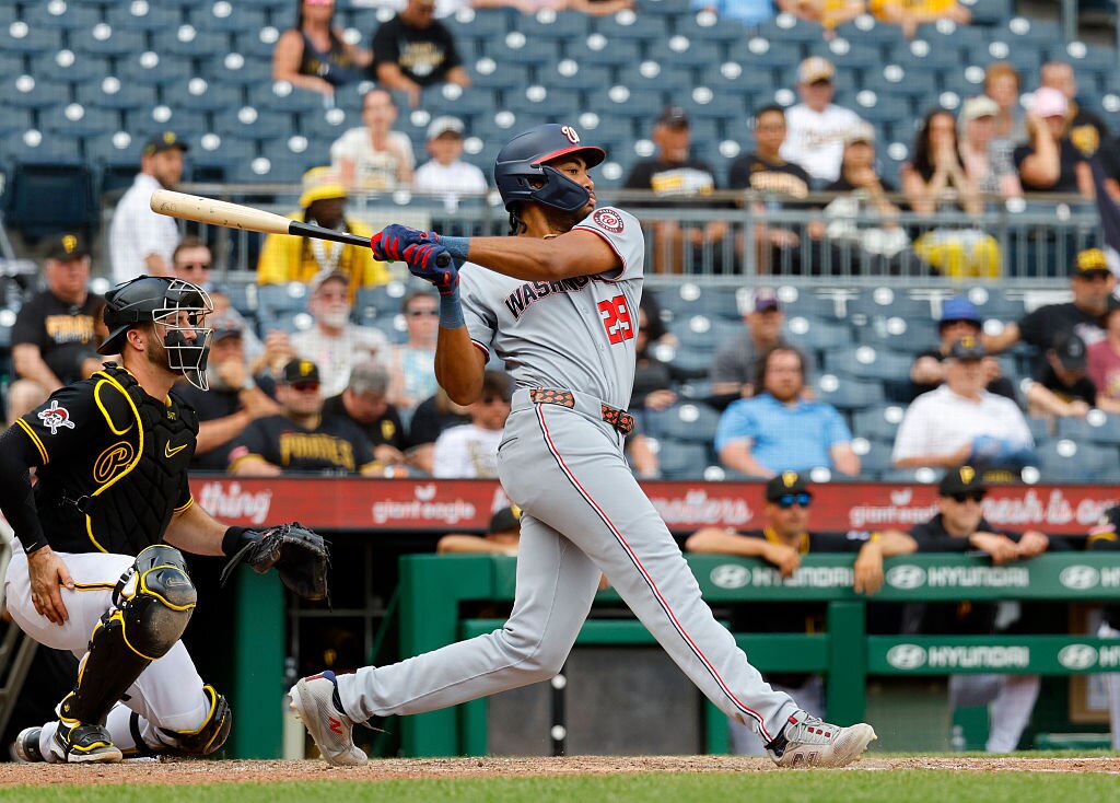 Washington Nationals right fielder James Wood hits an RBI single in the 10th inning.