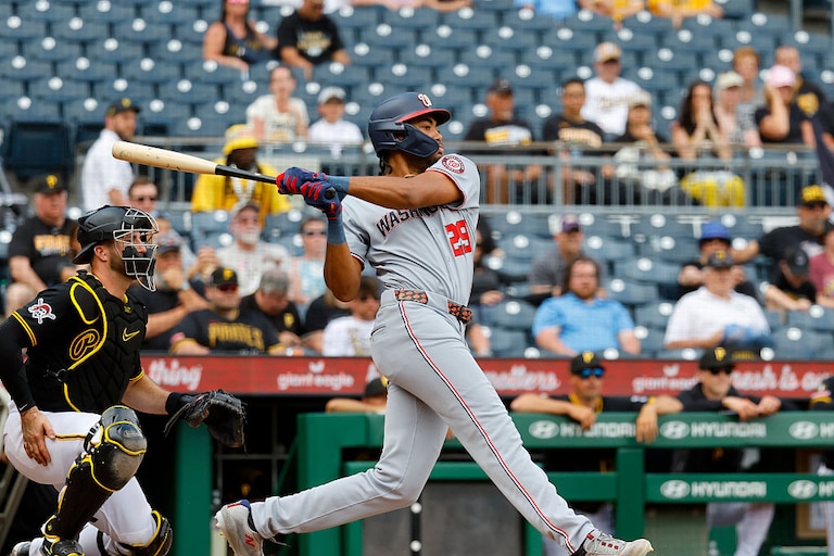 Washington Nationals right fielder James Wood hits an RBI single in the 10th inning.