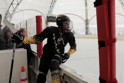 The Baltimore Banners player Chase Davis (#5) watches the game from the sidelines against the Team Huss of Reisterstown during the Rink Rally event at the Mimi DiPietro Skating Center.
