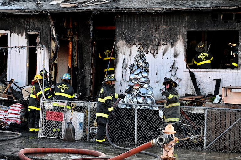 Baltimore City Fire Department crews respond to a blaze at Falkenhan’s Hardware in Hampden on Dec. 15, 2025.