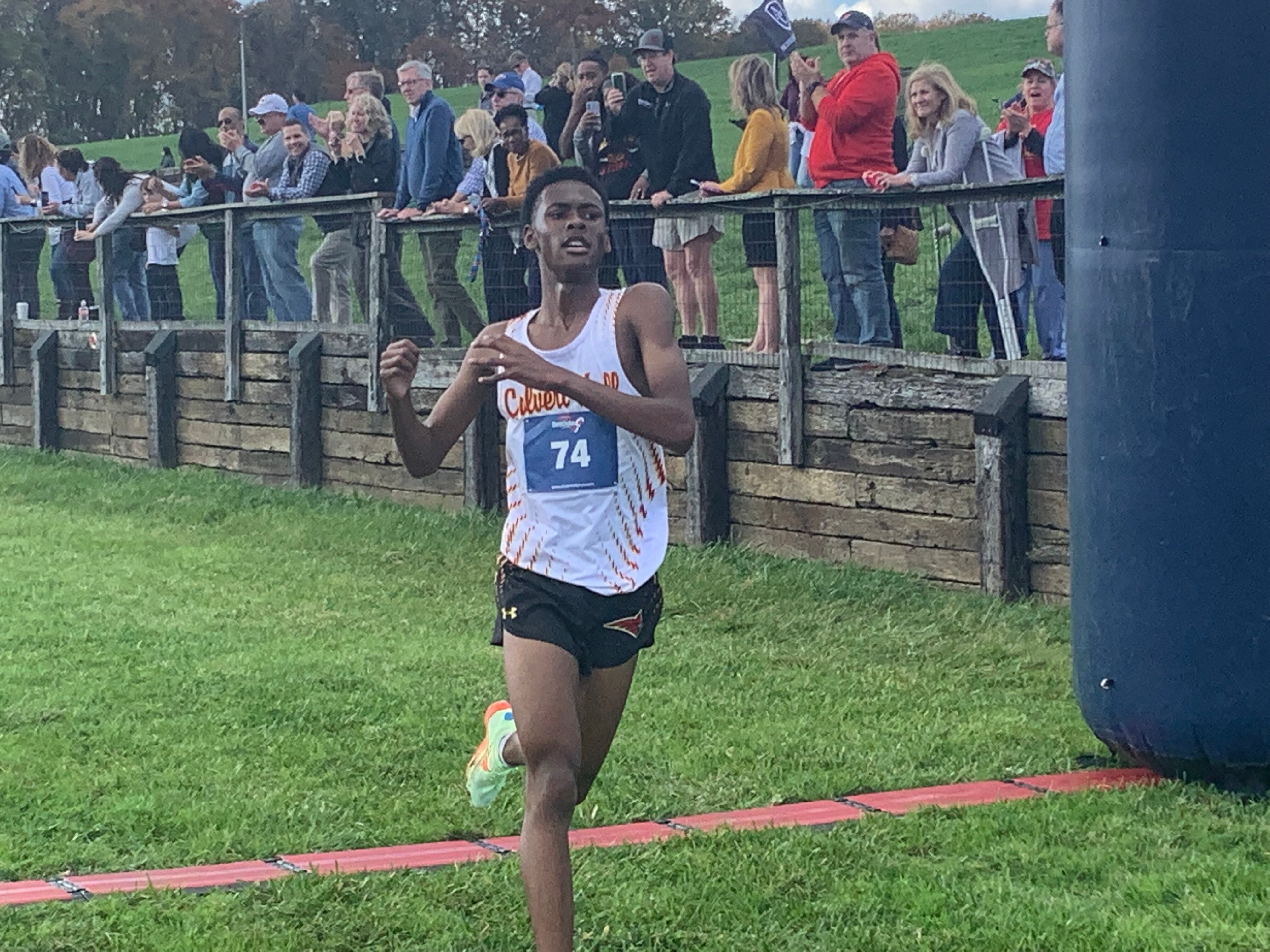Cameron Davis crosses the finish line first for Calvert Hall at Tuesday's MIAA A cross country championship race at Shawan Downs in Cockeysville. The junior clocked 15 minutes and 40 seconds for his second straight title.