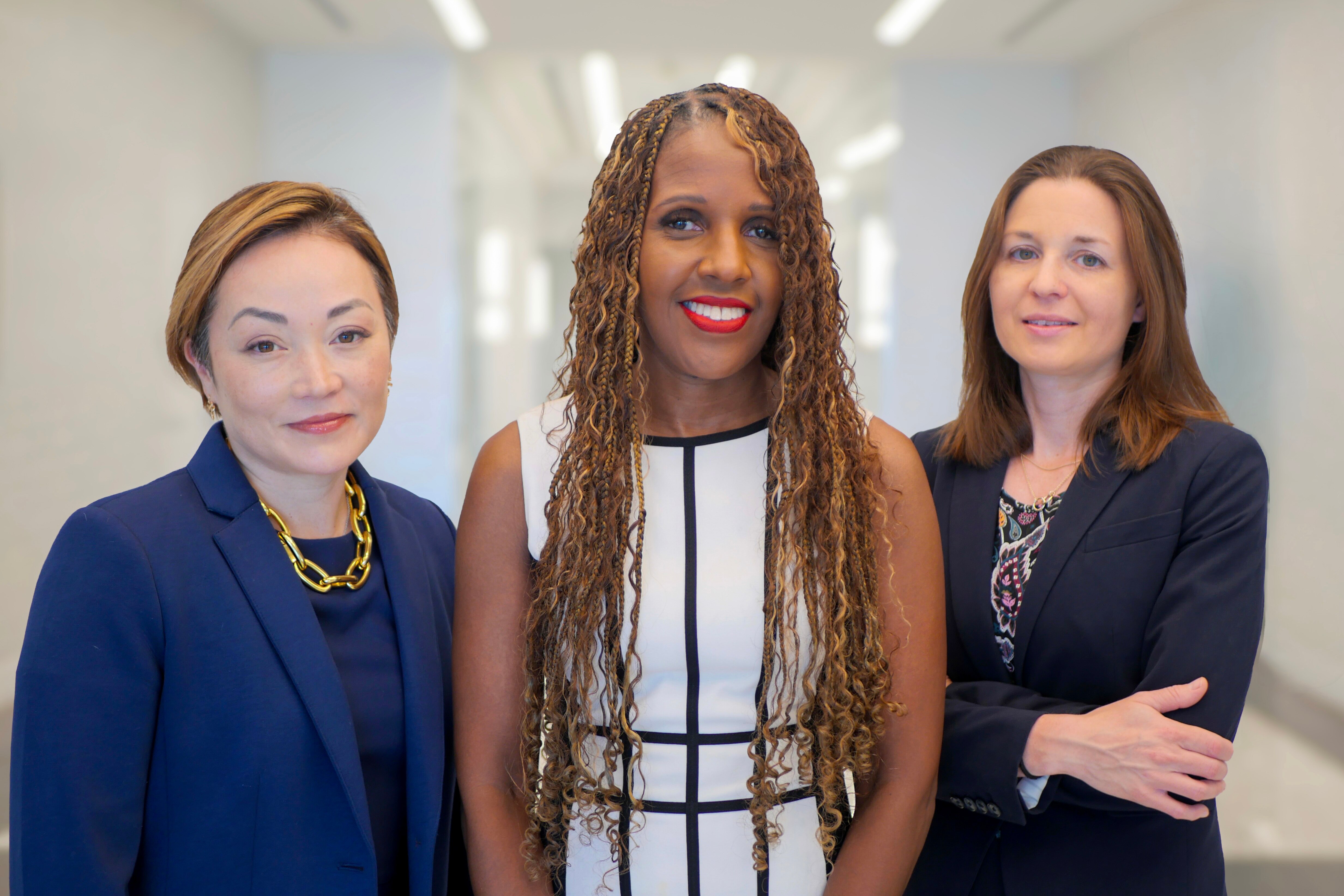 From left, Maryland Assistant Public Defender Erica Suter, Maryland Public Defender Natasha Dartigue, and Rachel Bennett, who most recently worked as a senior attorney at the Amica Center for Immigrant Rights, who is taking over for Suter as director of the Innocence Project Clinic at the University of Baltimore School of Law.