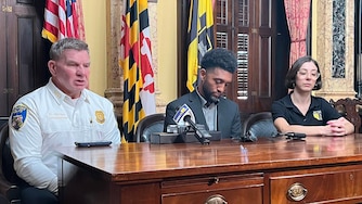 TUESDAY, OCTOBER 20, 2026 - Mayor Brandon Scott, center, meets with Police Commissioner Richard Worley, left, and Stefanie Mavronis, director of the Mayor’s Office of Neighborhood Safety and Engagement, at City Hall on Tuesday to discuss recent shootings and efforts to curb gun violence.