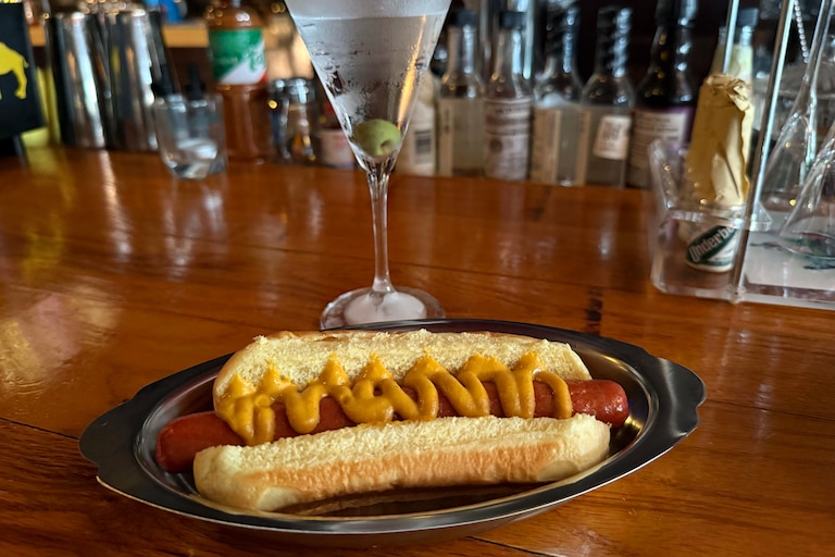 At NeatFreak, Canton’s newest cocktail bar, martinis come any way you like—but there’s only one food option: a $5 hot dog. Owner Matt Steinberg says the simple frankfurter is the perfect pairing for a bold cocktail.