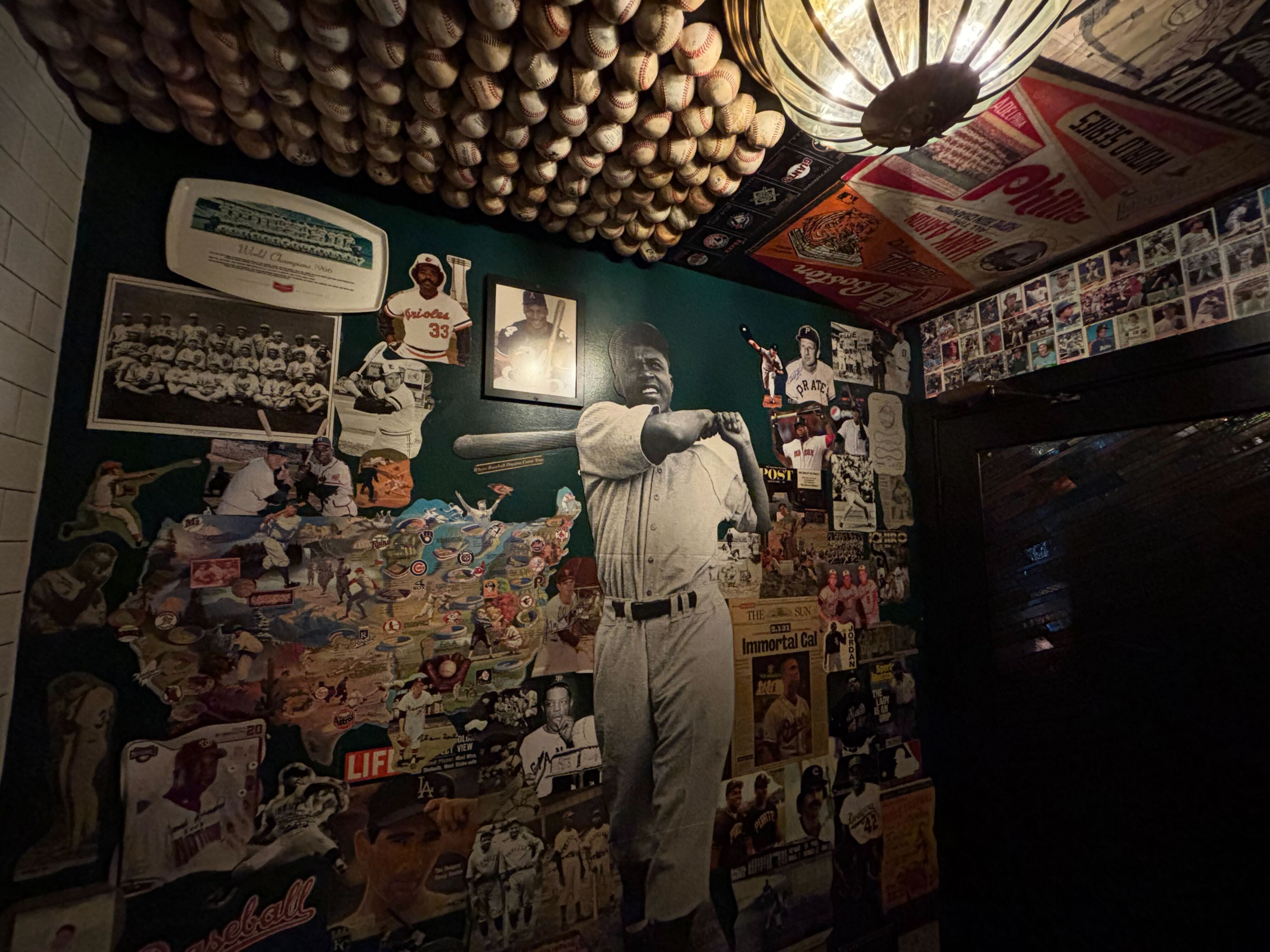 Inside the baseball-themed bathroom at Eebee's.