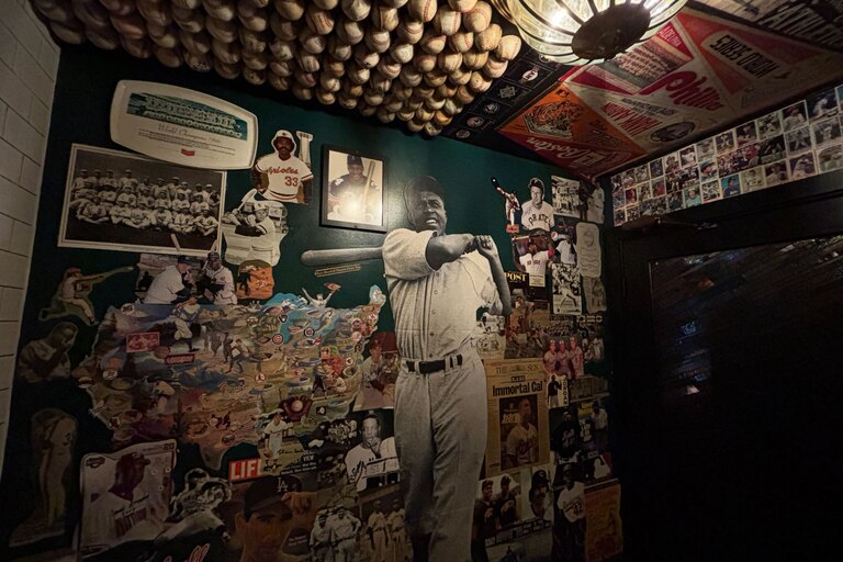 Inside the baseball-themed bathroom at Eebee's.