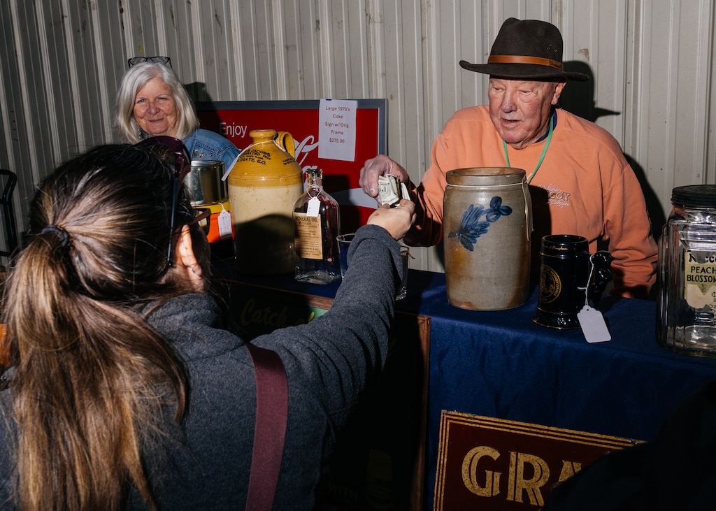 A deal being made at The Baltimore Antique Bottle Club 45th Annual Show & Sale at the Howard County Fair Grounds.