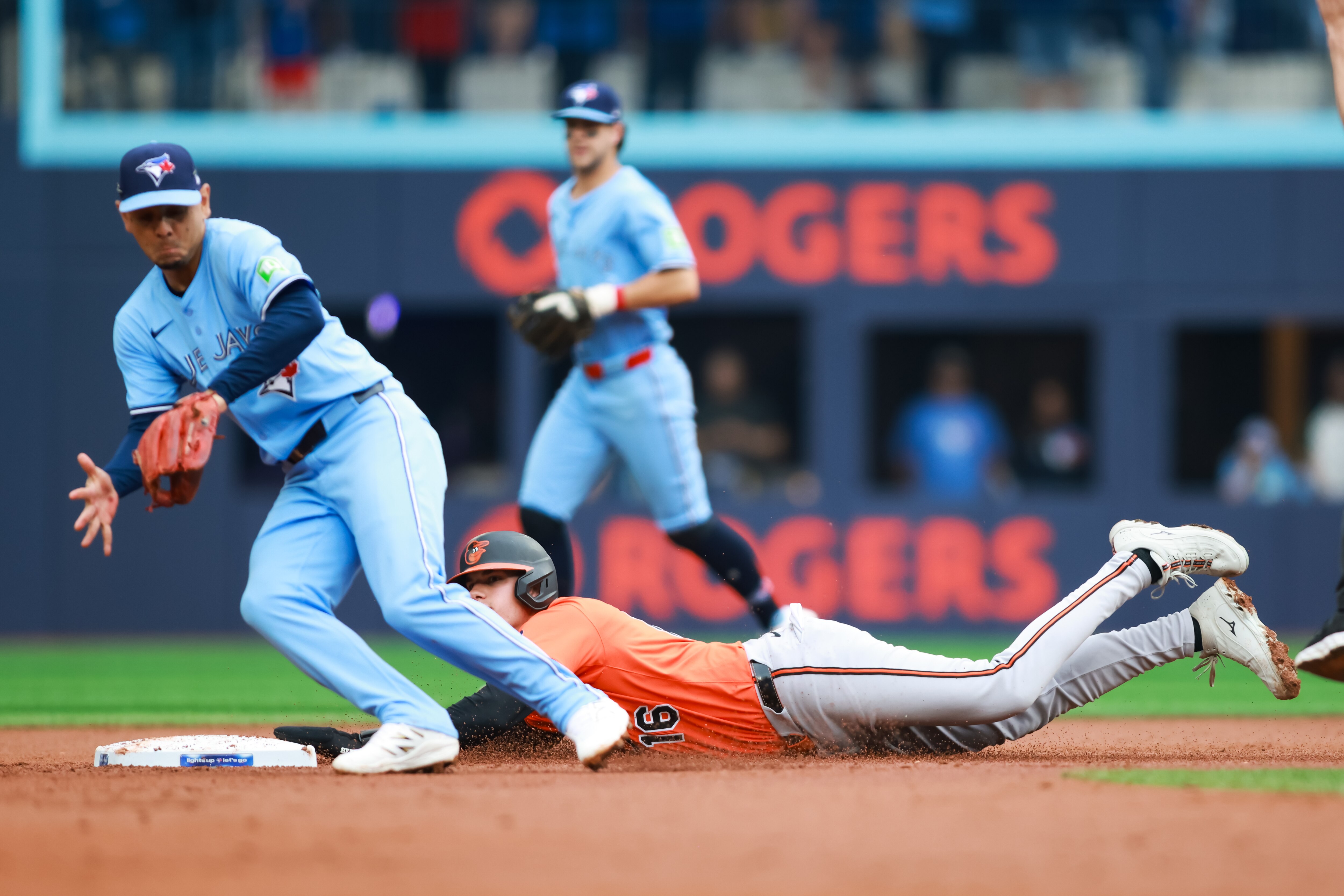 Coby Mayo of the Orioles steals second base in the second inning Saturday at Rogers Centre.