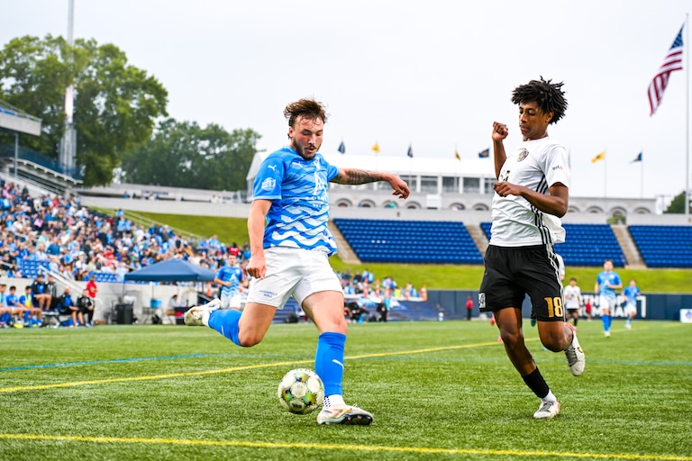 Brady Geho, the Annapolis Blues men's team all-time leading scorer, prepares to shoot the ball during a match on June 15, 2025.
