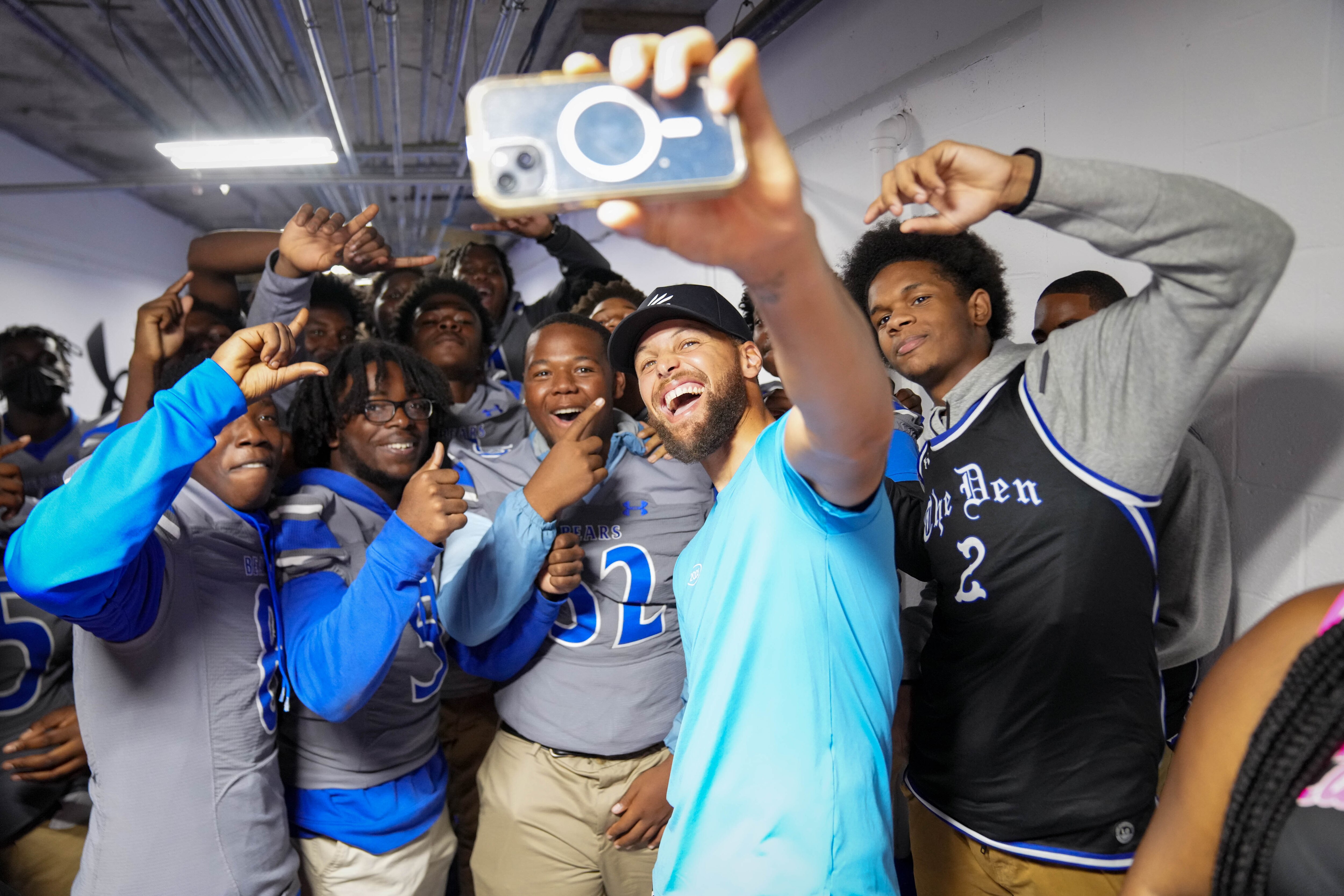 Steph Curry takes a selfie with student athletes during ‘Armour Day’ at Carver Vocational-Technical High School in Baltimore on Monday.