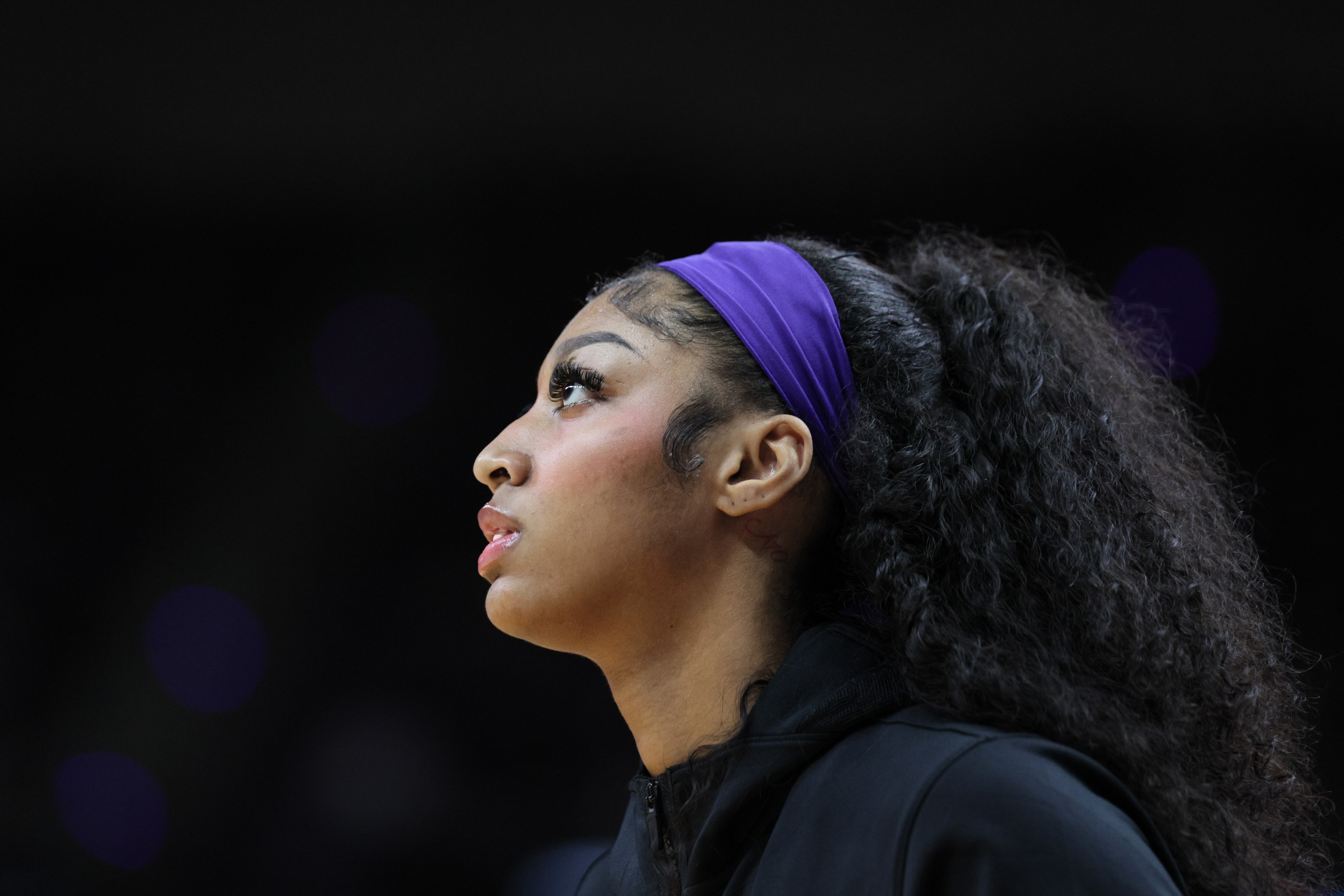Angel Reese of the LSU Tigers looks on prior to a game against the Iowa Hawkeyes in the Elite 8.