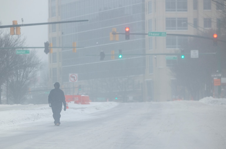 A man walks down Georgia Ave. on Sunday, Jan. 25, 2026, during a snowstorm in Silver Spring, Md.