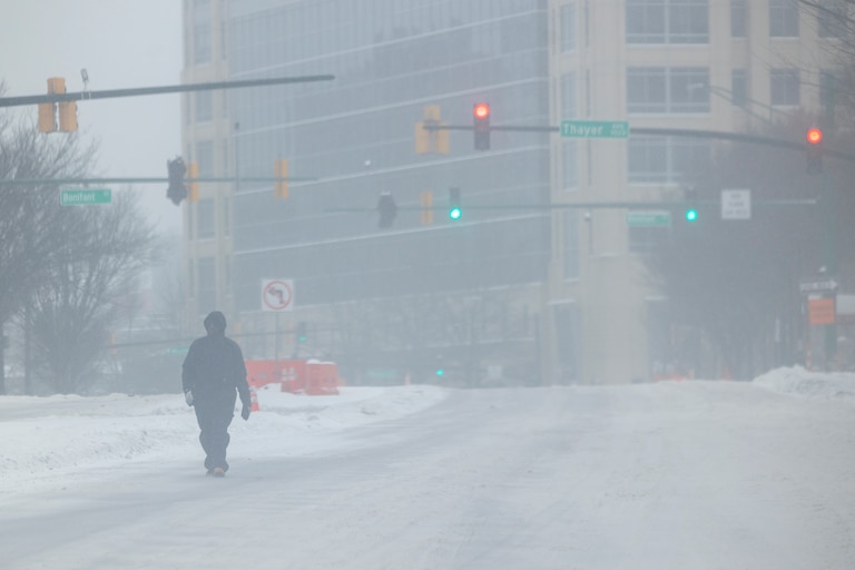 A man walks down Georgia Ave. on Sunday, Jan. 25, 2026, during a snowstorm in Silver Spring, Md.