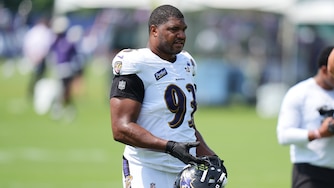 Baltimore Ravens defensive end Calais Campbell (93) watches during the team's NFL football training camp, Tuesday, Aug. 11, 2026, at the Under Armour Performance Center in Owings Mills, Md.