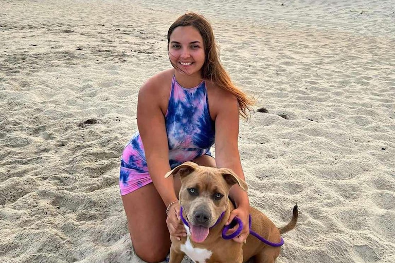 Cameran Holt and her dog, Rein, during a family vacation to the Outer Banks, N.C., in 2023.