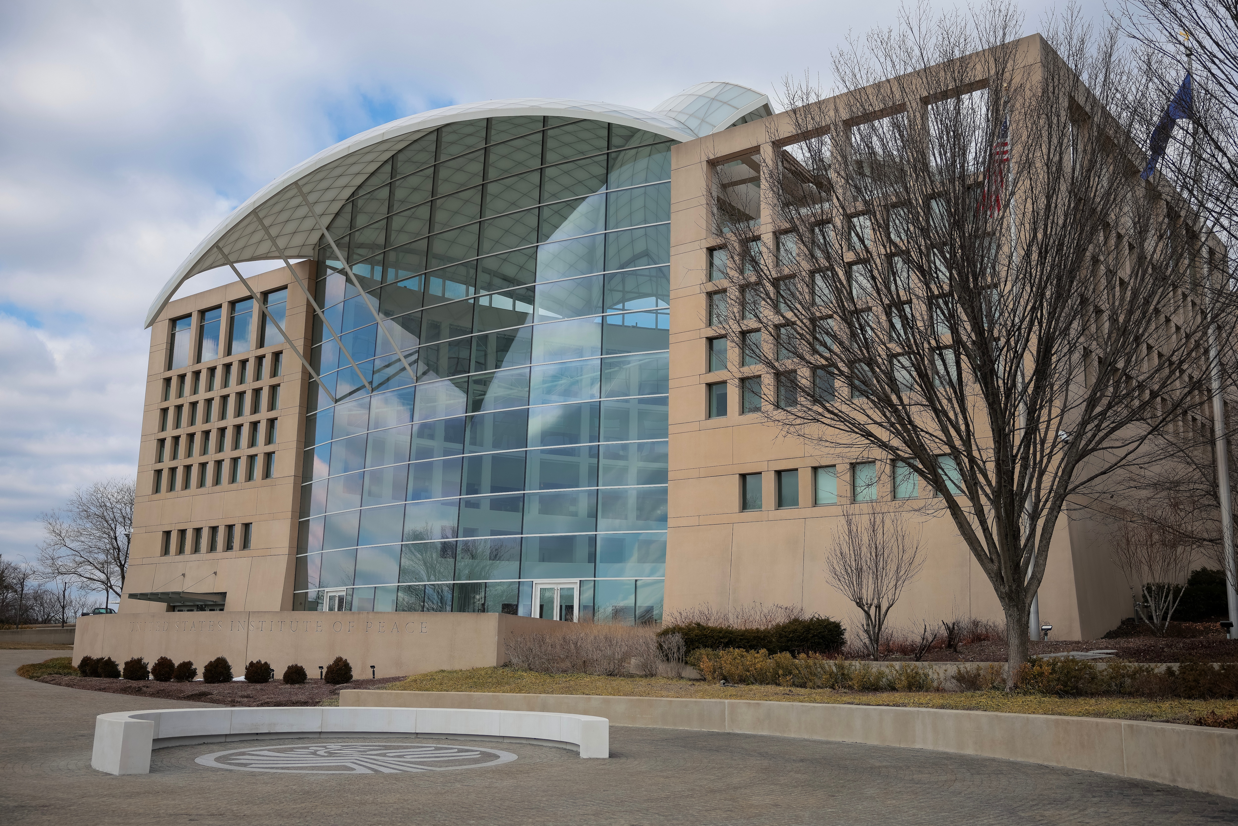 WASHINGTON, DC - FEBRUARY 20: A sign for the United States Institute of Peace (USIP) is seen on its' building headquarters on February 20, 2025 in Washington, DC. U.S. President Donald Trump signed an executive order to disband multiple federal advisory committees including the Institute of Peace.