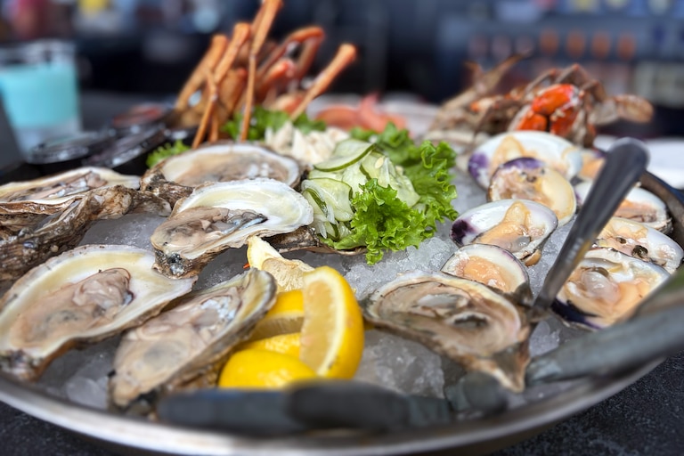 The Cold Seafood Platter, featuring raw oysters and clams, shrimp, snow crab leg clusters, jumbo lump crabmeat and two medium Maryland crabs at Nick's Fish House.