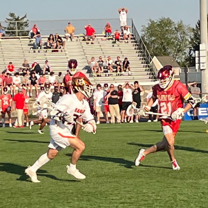 McDonogh attack Jack Raley (left) works against Calvert Hall's Josh Nagy during the second half of Friday's MIAA A Conference lacrosse contest. The No. 2 Eagles broke a 6-6 deadlock with back-to-back goals and held on for a 9-7 victory in a nationally televised game in Owings Mills.