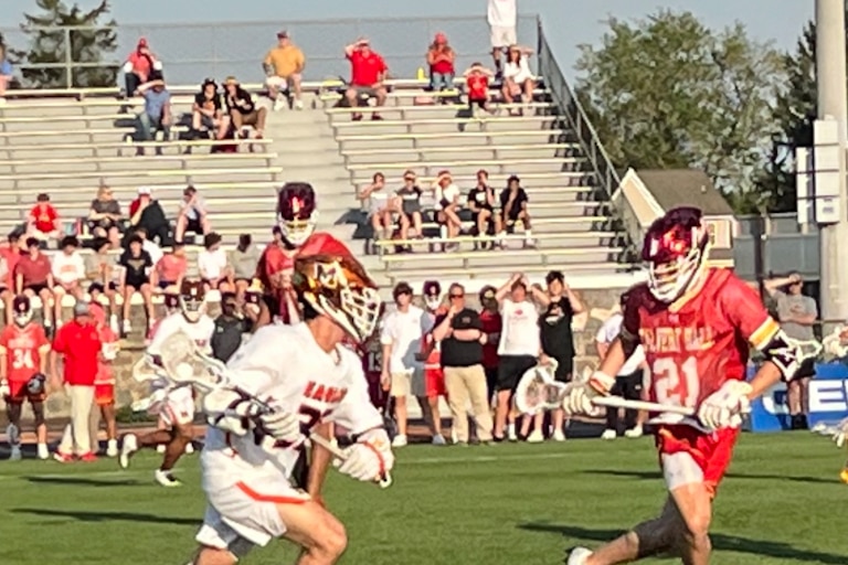 McDonogh attack Jack Raley (left) works against Calvert Hall's Josh Nagy during the second half of Friday's MIAA A Conference lacrosse contest. The No. 2 Eagles broke a 6-6 deadlock with back-to-back goals and held on for a 9-7 victory in a nationally televised game in Owings Mills.