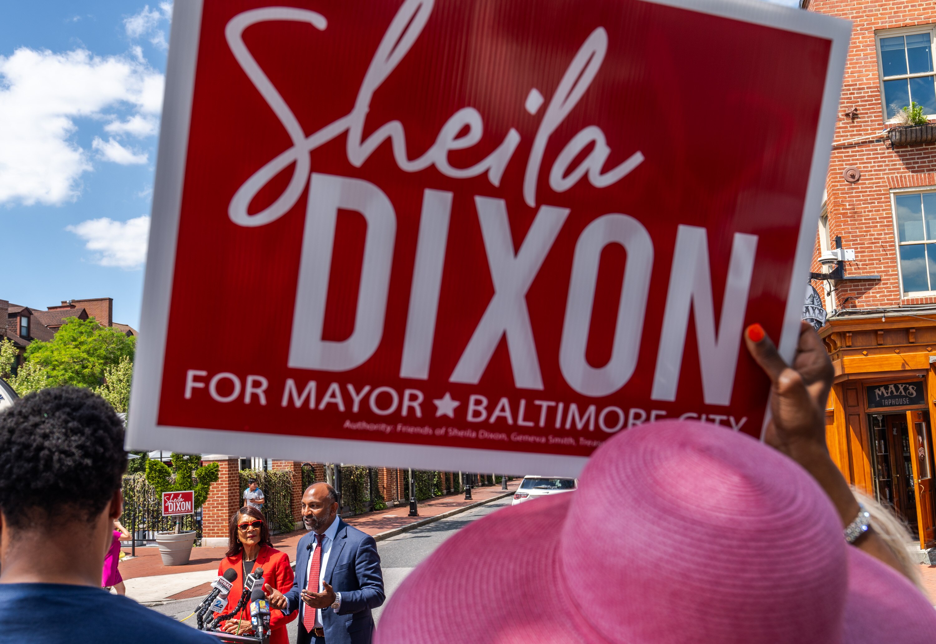 A supporter holds a sign for Sheila Dixon at Thiru Vignarajah’s announcement that he’s dropping out of the Baltimore mayoral race and endorsing Dixon on May 1, 2024.