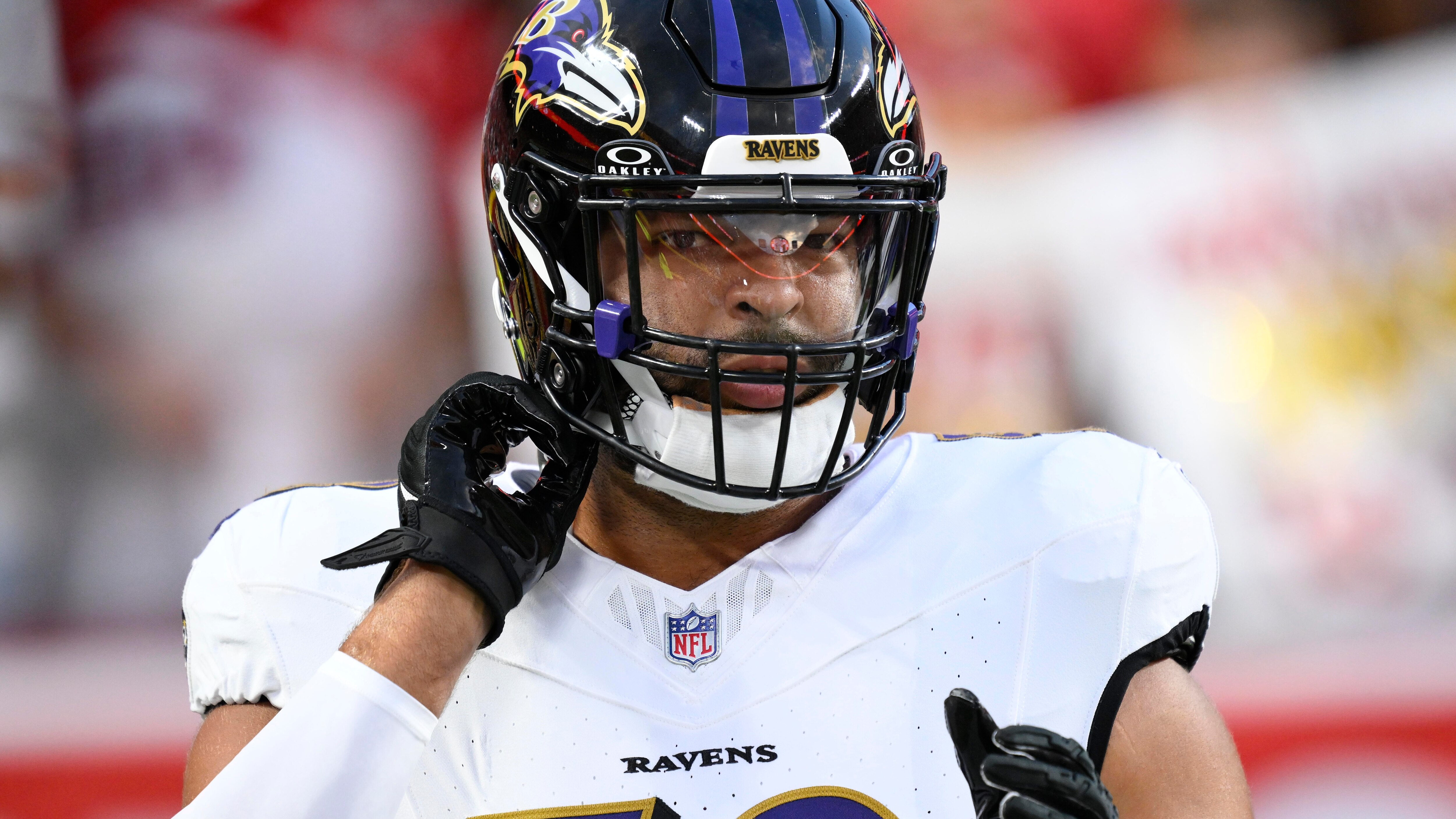 Baltimore Ravens linebacker Kyle Van Noy takes part in drills before the start of an NFL football game against the Kansas City Chiefs, Thursday, Sept. 5, 2024 in Kansas City, Mo. The Chiefs defeated the Ravens by a score of 27-20. (AP Photo/Reed Hoffmann)