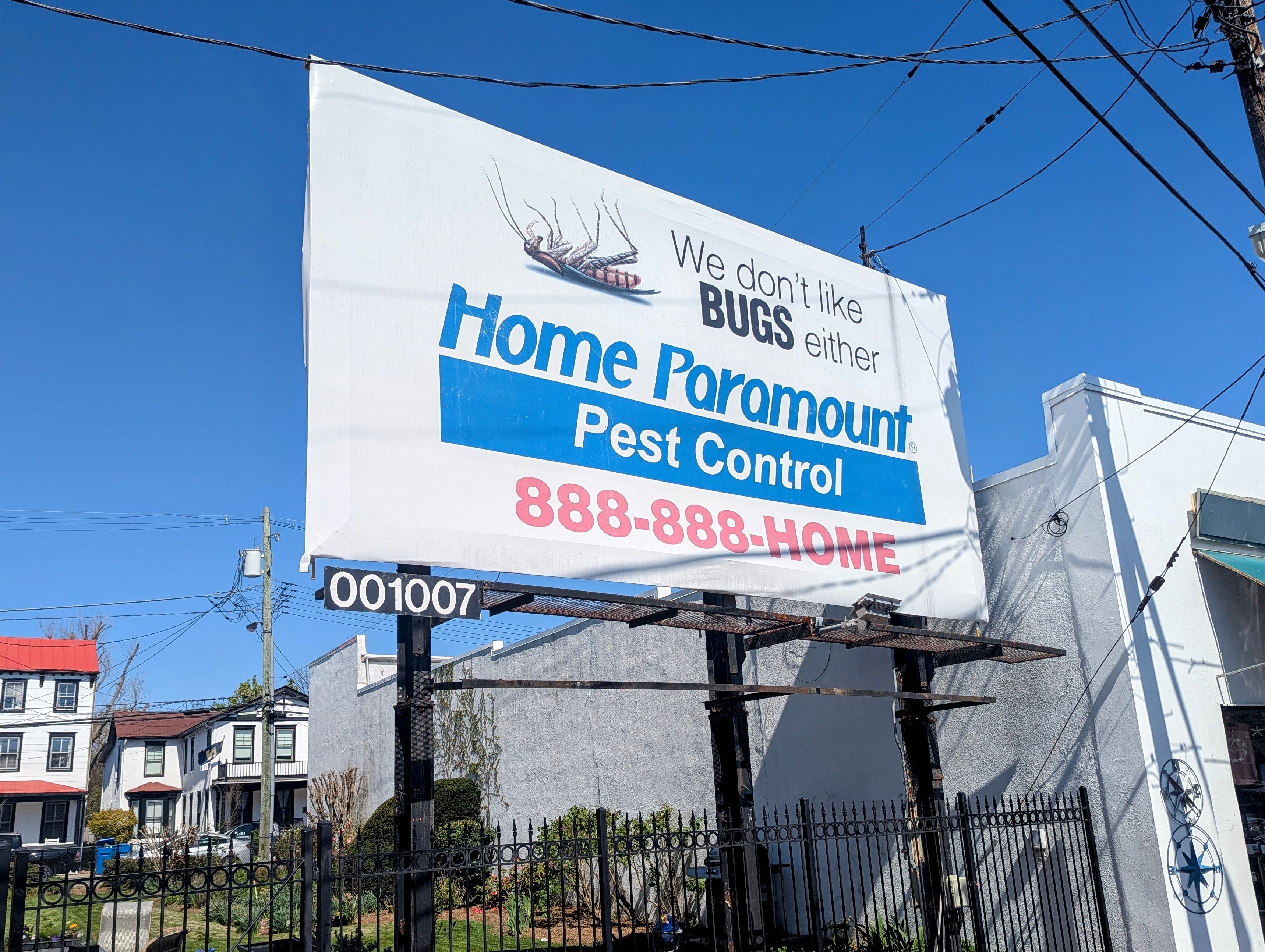 The billboard at City Dock has been there for more than a century, its owners say, but has featured a dead cockroach for the last few years.