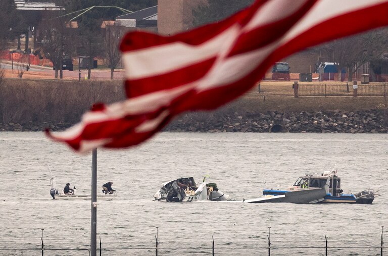ARLINGTON, VIRGINIA - JANUARY 31: Recovery teams search the wreckage after the crash of an American Airlines plane on the Potomac River as it approached the airport on January 31, 2025 in Arlington, Virginia. The American Airlines flight from Wichita, Kansas collided midair with a military Black Hawk helicopter while on approach to Ronald Reagan Washington National Airport. According to reports, there were no survivors among the 67 people on both aircraft.