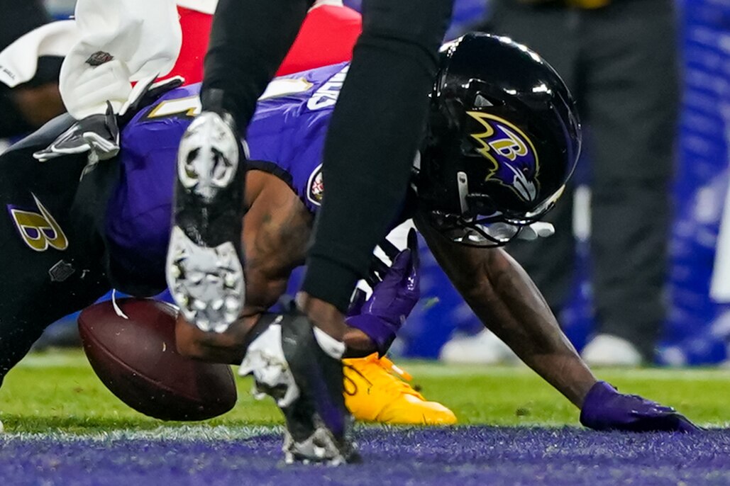 Ravens wide receiver Zay Flowers fumbles near the goal line early in the fourth quarter.