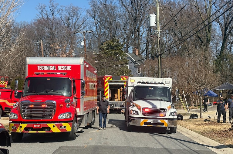 Montgomery County rescue teams pulled two construction workers from a trench that collapsed near a Bethesda home on Tuesday.