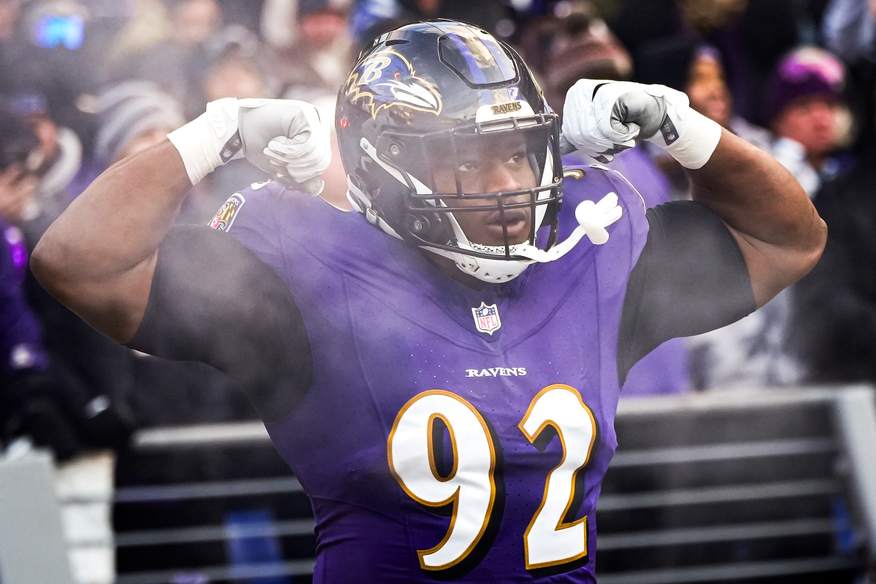 Baltimore Ravens defensive tackle Justin Madubuike (92) runs onto the field for the AFC divisional playoff game against the Houston Texans at M&T Bank Stadium on Saturday, Jan. 20, 2024.