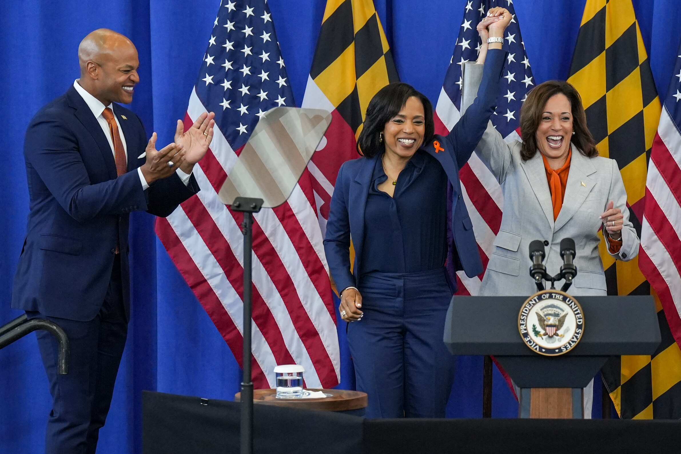 Maryland Gov. Wes Moore (left) applauds as U.S. Vice President Kamala Harris (right) endorses U.S. Senate candidate Angela Alsobrooks last month. Moore is now endorsing Harris for president.