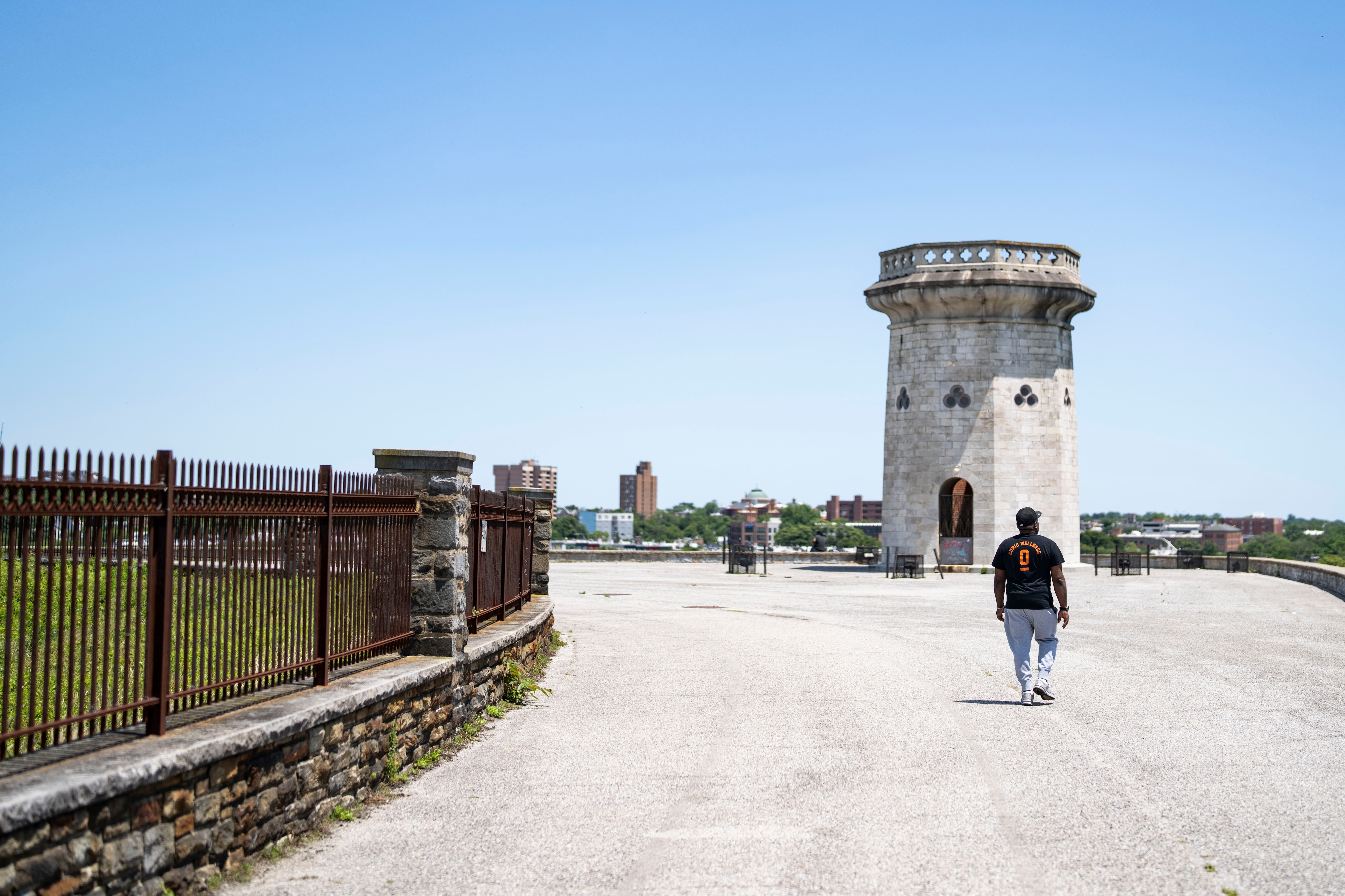 Carl Barnhill of Baltimore, walks near Moorish Tower at the Druid Hill Park walking loop in Baltimore, Monday, June 2, 2025.