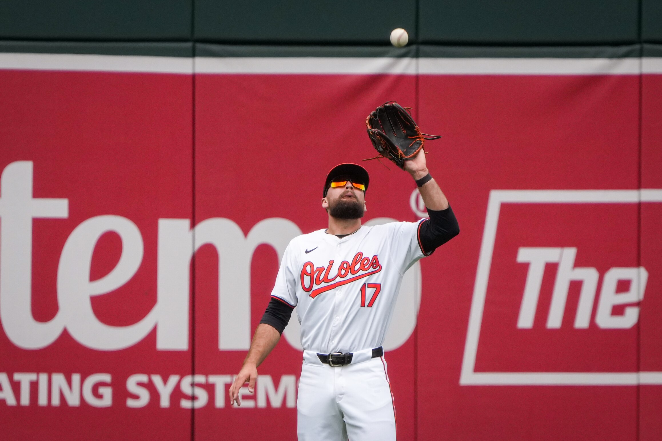 Colton Cowser (17) catches a fly out during a game against the Minnesota Twins.