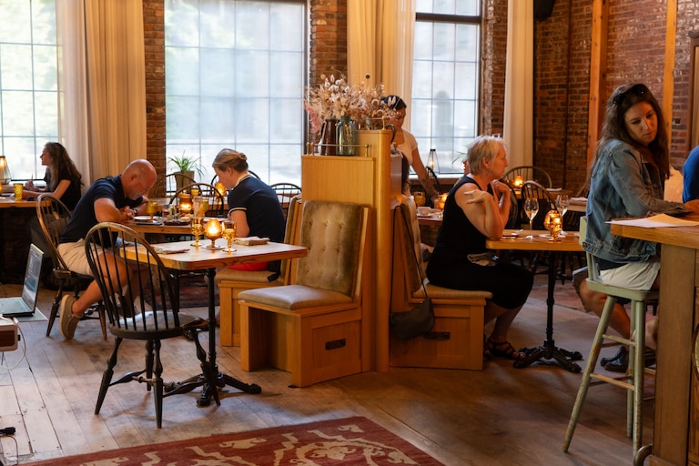 People are photographed dining at Woodberry Kitchen on July 10, 2024.