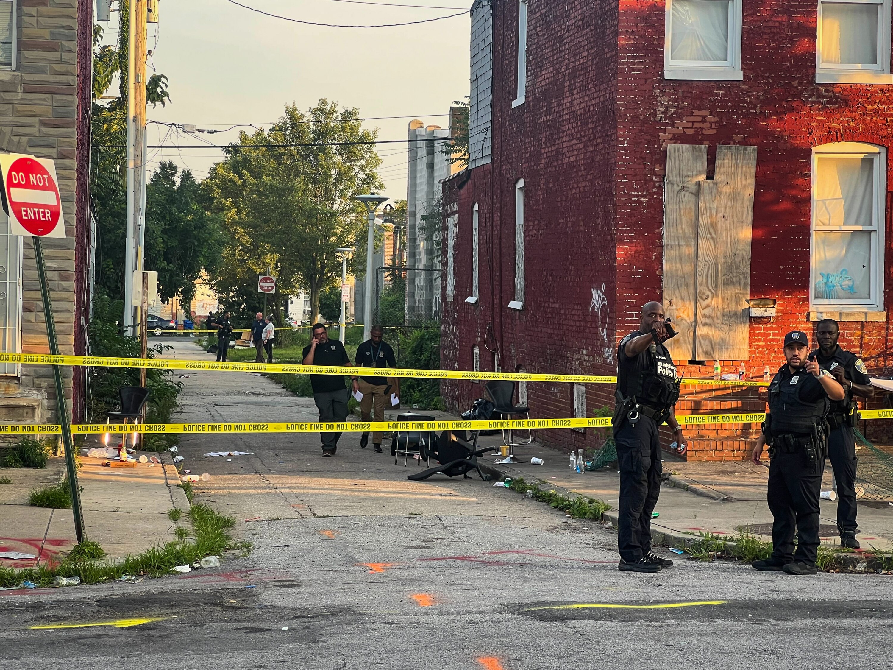 Baltimore Police at the site of a shooting at Goldsmith Alley and McHenry Street in West Baltimore on Monday,  June 23, 2025.